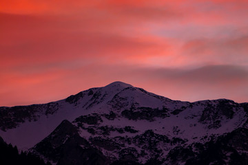 Fototapeta na wymiar Mountains with red colour sky