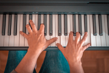 Woman and her piano in home