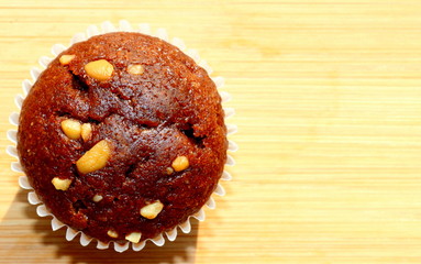 A closeup of  a delicious brown muffin