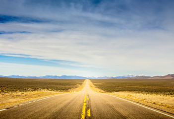 A Lonely Long Road with a Stunning Scenic Landscape View