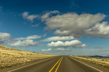 A Lonely Long Road with a Stunning Scenic Landscape View