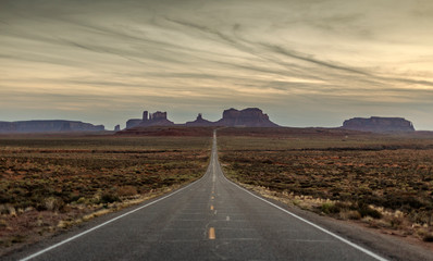 Fototapeta na wymiar A Lonely Long Road with a Stunning Scenic Landscape View