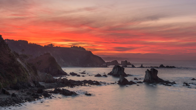 From above amazing seascape and cliff coastline in colorful sundown in Costa Brava
