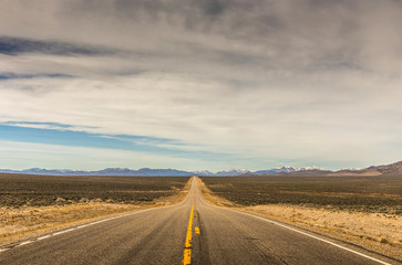 A Lonely Long Road with a Stunning Scenic Landscape View