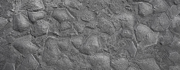 gray abstract texture in cracks and scratches metal background