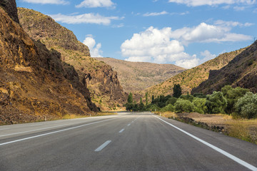 A Lonely Long Road with a Stunning Scenic Landscape View
