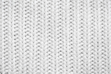 White knitted texture and background.