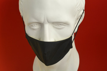 Julius Caesar in a protective black mask. Coronavirus protection.