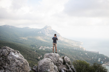 A chic view and a man on the edge of a cliff-Crimea