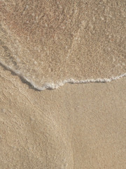 wave on the sand
