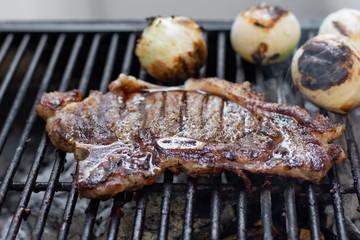 Close up of a delicious barbecue steak on a grill