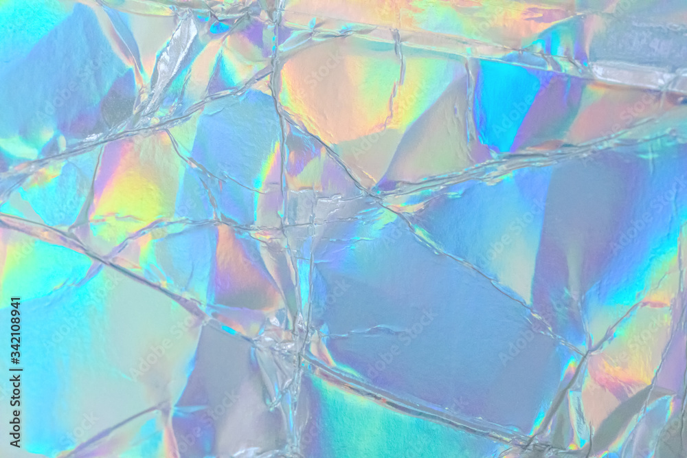 Poster blurred abstract modern pastel colored holographic background in 80s style. crumpled iridescent foil