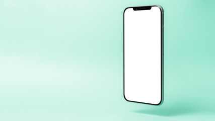 Smartphone mockup, phone with blank screen and shadow isolated on green background. Symbol of...