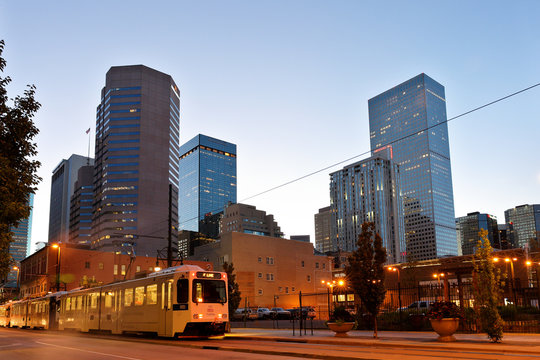 Denver Downtown at Early Morning. Photo Shows Rail Train Running on California Street, Denver Colorado.