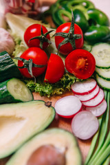 Chopped vegetables: tomatoes on cutting board. Selective focus