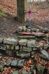 Ostrava. Cross at the spring of Mother of God in Belsky les. Czechia. Europe.