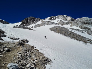 Slovenia Julian Alps. A lonely wanderer while hiking on Triglav.