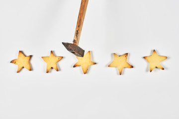 Smashing sweet five stars with a hammer