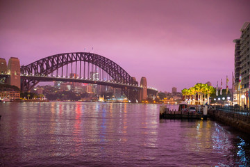 Fototapeta na wymiar SYDNEY, AUSTRALIA - February 2, 2020: Sydney Harbour Bridge located in Sydney, NSW, Australia. Australia is a continent located in the south part of the earth.