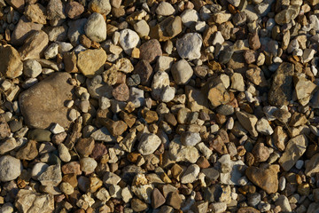 Background from small stones on the river side 