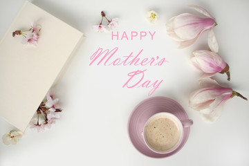 Fototapeta na wymiar beautiful tender flat still life, card on a beige background for mother's day, magnolia buds, cup of cappuccino, concept of floral spring background