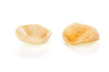 Snack potatoes, chips and pepper isolated on white background. Close-up. Full depth of field.