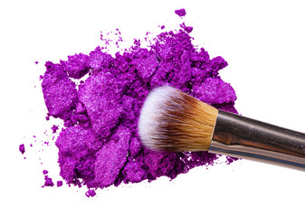 Smashed eyeshadows of bright purple color, make up concept