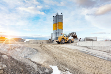 Quarry for the extraction of sand and stone, its transformation into gravel and cement manufacturing