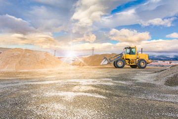 Quarry for the extraction of sand and stone, its transformation into gravel and cement manufacturing
