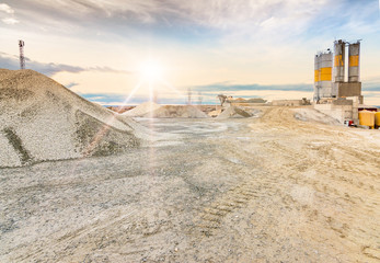 Quarry for the extraction of sand and stone, its transformation into gravel and cement manufacturing
