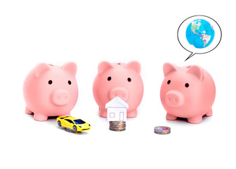 Three pink piggy banks with  dreaming about car, house, journey something with coins / money in front of them isolated against white background  