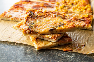 Pieces of homemade Italian pizza.
