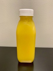 Natural juice made with pineapple, orange, pear, orange, echinacea, and green tea for improved health and immunity 