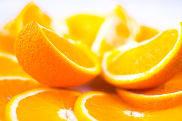 Fresh yellow oranges on a white background
