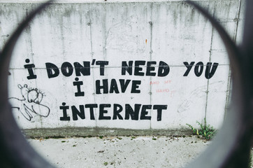 Street graffiti, I don't need you I have internet