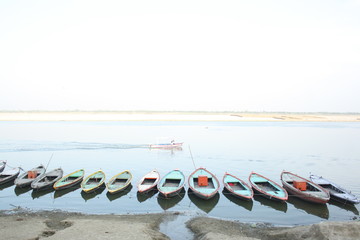 a row of boats in holy Ganga