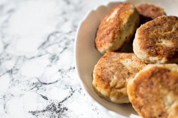 Cutlets on a white plate