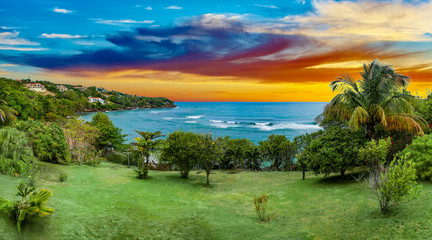 Grenada sunset over the ocean water, Caribbean Sea - obrazy, fototapety, plakaty