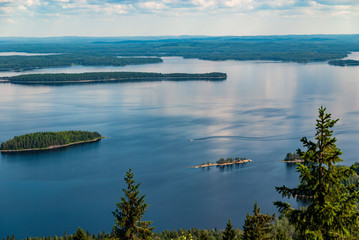 Lake and hills and islands from Koli Finland. Nice Finnish summer landscape from a vacation tourist attraction area. 