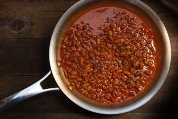 Vegan chili beans in stainless steel pan