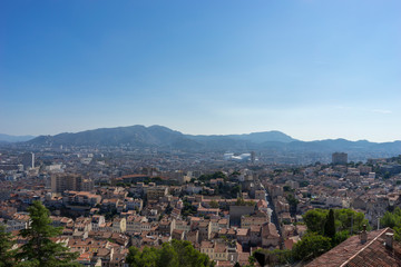 Fototapeta na wymiar The amazing areal view on Marseille from mountain where is church od Notre Dame de la Guarde , France