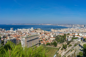 Fototapeta premium The amazing areal view on Marseille from mountain where is church od Notre Dame de la Guarde , France