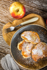Homemade pancakes on a wooden table.