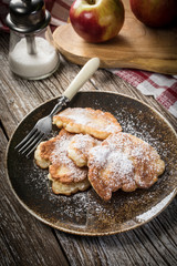 Homemade pancakes on a wooden table.