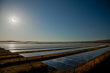 Solar Farm During Solar Eclipse - Solar Panels 