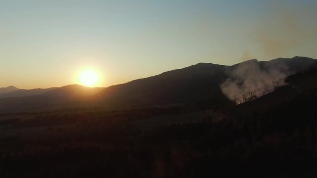 4k Aerial Drone Shot - Extinguishing A Forrest Fire During Sunset - Nice Color Cinematic Footage