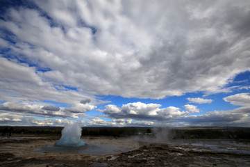 Geysir / Iceland - August 25, 2017: Strokkur geysir eruption near Golden Circle, Iceland