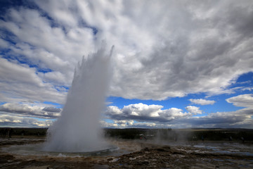 Geysir / Iceland - August 25, 2017: Strokkur geysir eruption near Golden Circle, Iceland