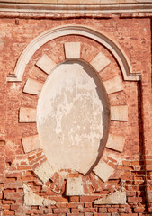 Brick oval fragment of an ancient temple.