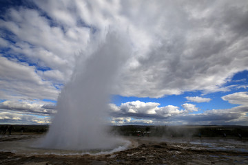 Geysir / Iceland - August 25, 2017: Strokkur geysir eruption near Golden Circle, Iceland